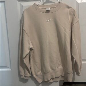Tan Nike sweatshirt